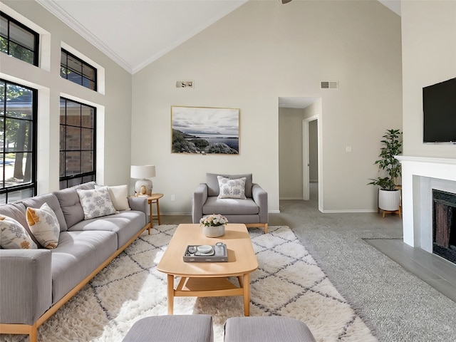 living room featuring light colored carpet, high vaulted ceiling, and ornamental molding