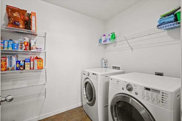 washroom featuring independent washer and dryer