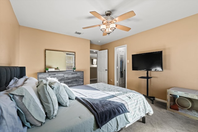 bedroom with ceiling fan and carpet