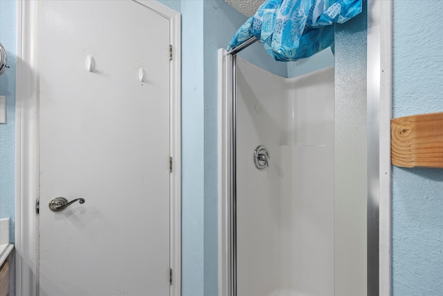 bathroom with walk in shower