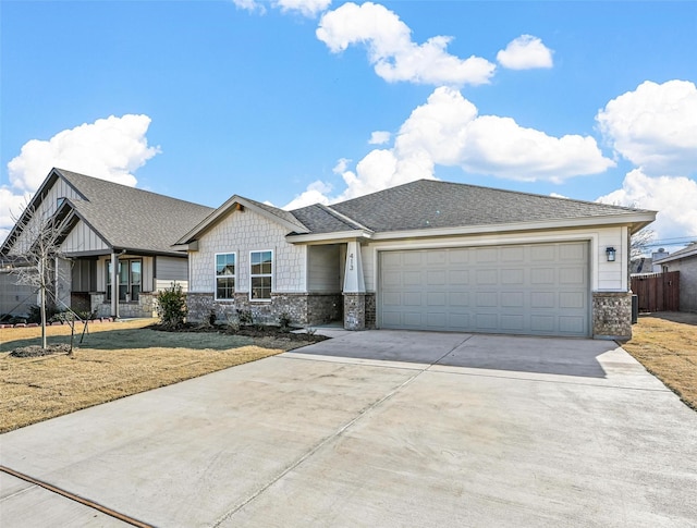 view of front facade with a garage and a front yard