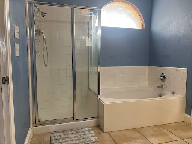 bathroom with independent shower and bath