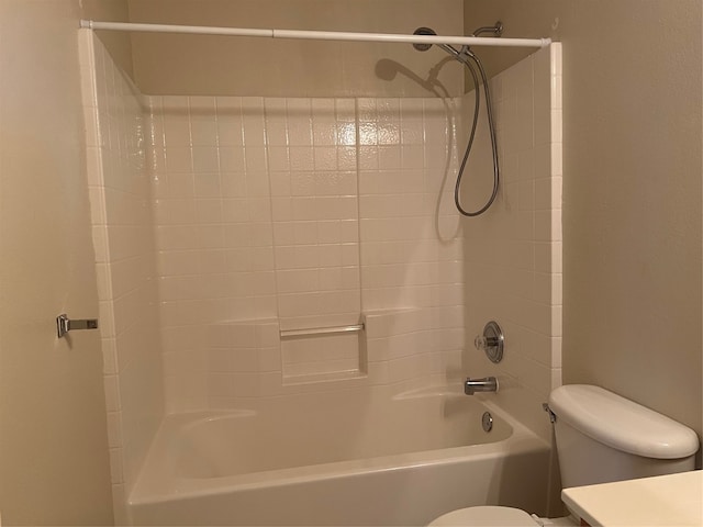 full bathroom featuring vanity, toilet, and tiled shower / bath combo