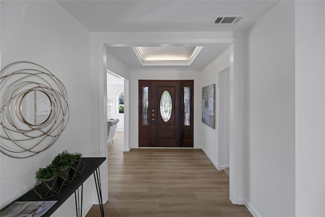 entryway with wood-type flooring