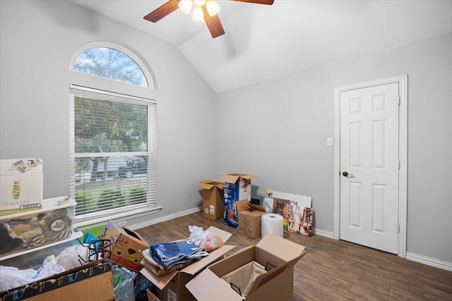 playroom with lofted ceiling, dark hardwood / wood-style floors, and ceiling fan