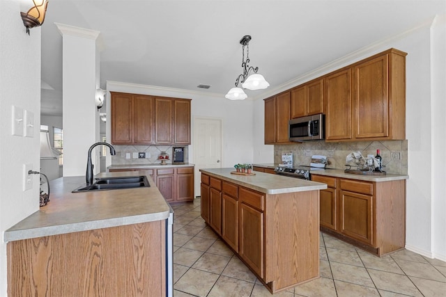 kitchen with backsplash, electric range oven, crown molding, sink, and pendant lighting