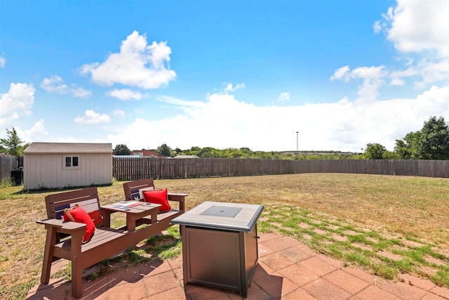 view of patio / terrace featuring an outdoor structure and a wooden deck