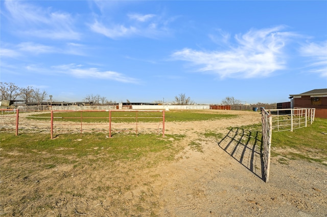 view of yard with a rural view