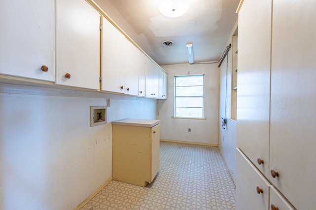 laundry room featuring cabinets and hookup for a washing machine