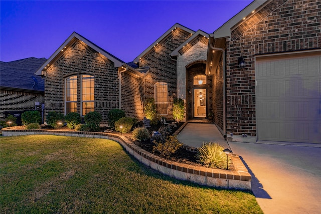 2216 Rosalinda Pass, Fort Worth, TX 76131 - view of front of property featuring brick siding, a front yard, a garage, and stone siding