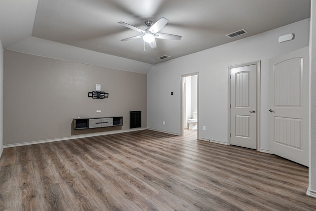 unfurnished living room featuring wood-type flooring, ceiling fan, and lofted ceiling