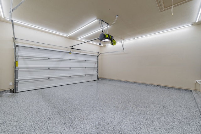 garage featuring a garage door opener