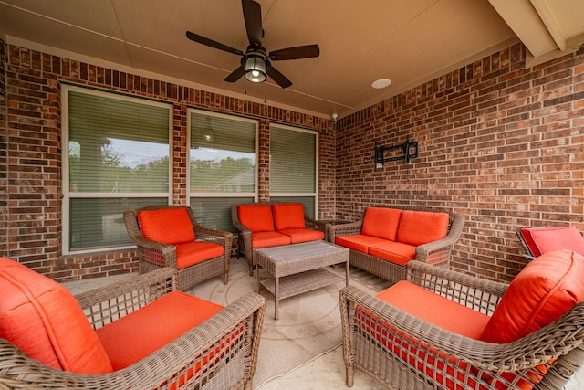 view of patio / terrace featuring ceiling fan and an outdoor living space