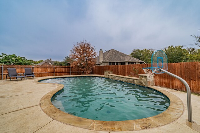 2216 Rosalinda Pass, Fort Worth, TX 76131 - view of swimming pool featuring a fenced backyard and a patio