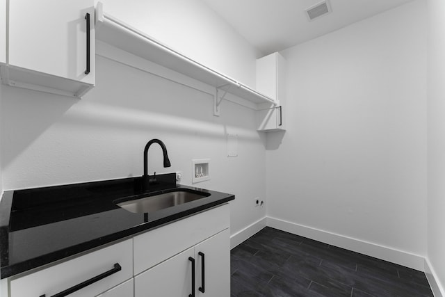 laundry area with washer hookup, sink, cabinets, and hookup for an electric dryer