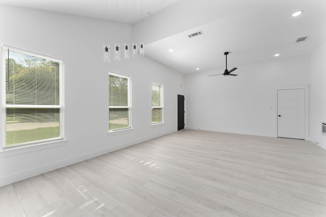 unfurnished room with ceiling fan and light wood-type flooring