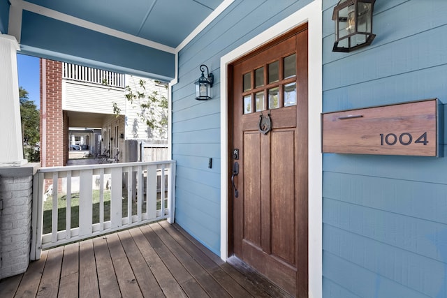 entrance to property with a porch