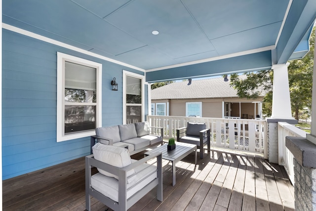 wooden deck with outdoor lounge area