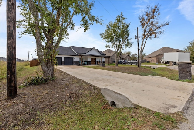 single story home with a garage