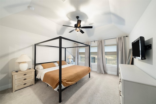 carpeted bedroom with lofted ceiling and ceiling fan