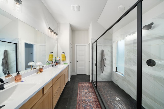 bathroom with vanity, a shower with shower door, and tile patterned flooring