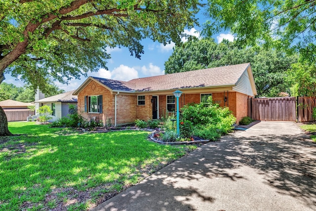 ranch-style home with a front yard