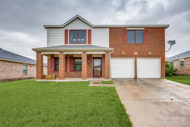 view of front of house featuring a front lawn and a garage