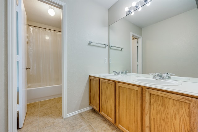 bathroom with vanity, tile patterned floors, and shower / bath combination with curtain