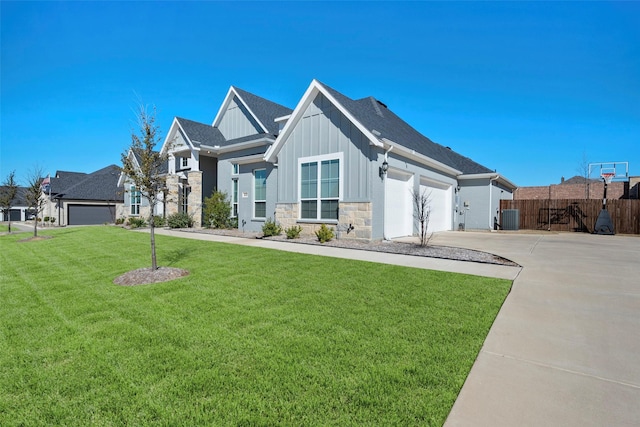 view of front facade with board and batten siding, a front yard, fence, a garage, and driveway