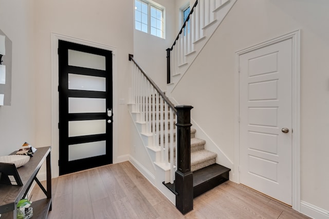 foyer with light wood-type flooring