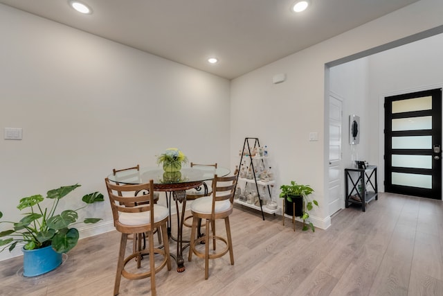 dining room featuring light wood-type flooring