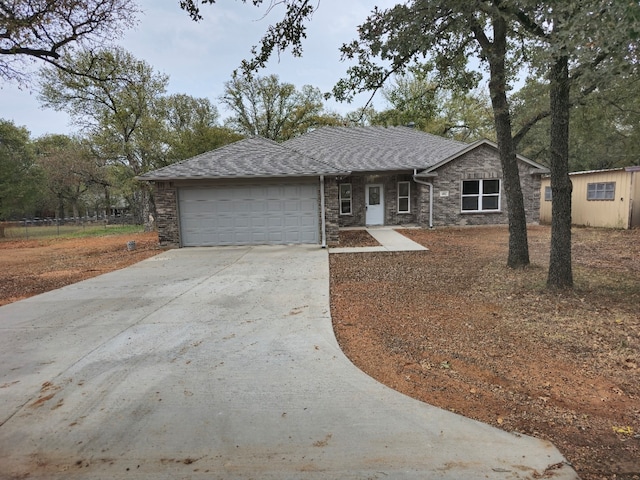 ranch-style house featuring a garage