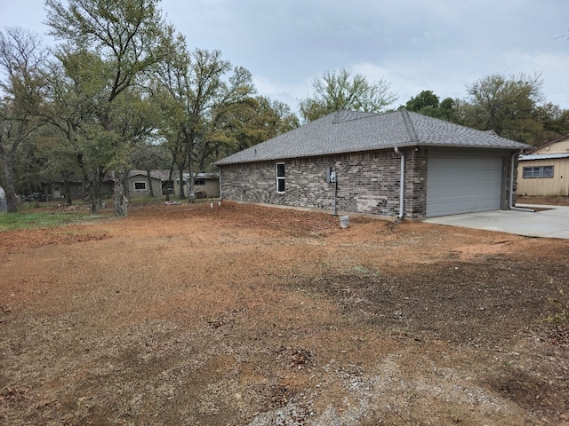 view of home's exterior with a garage