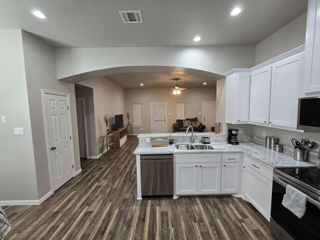 rear view of property featuring central AC unit and a patio