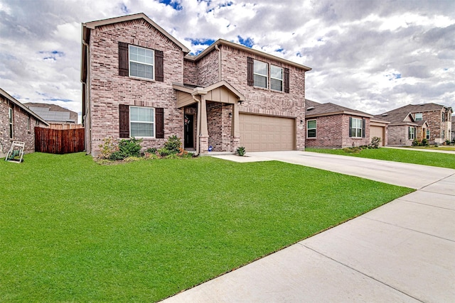 view of front of home featuring a garage and a front lawn