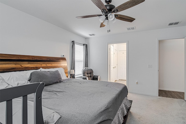 carpeted bedroom featuring ceiling fan