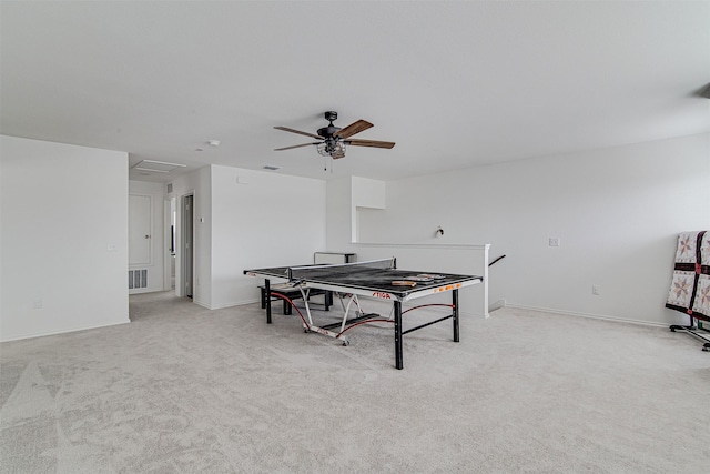 recreation room featuring ceiling fan and light carpet