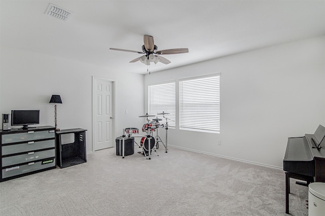 miscellaneous room with light carpet and ceiling fan