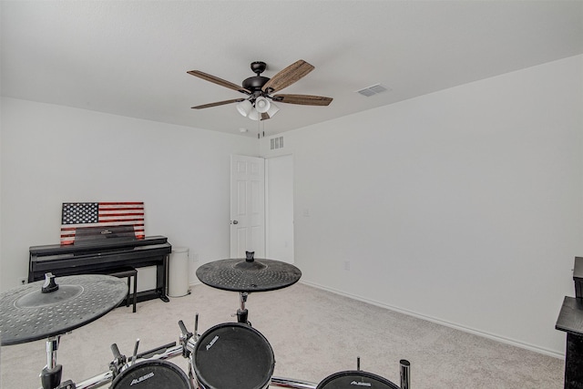 miscellaneous room with carpet and ceiling fan