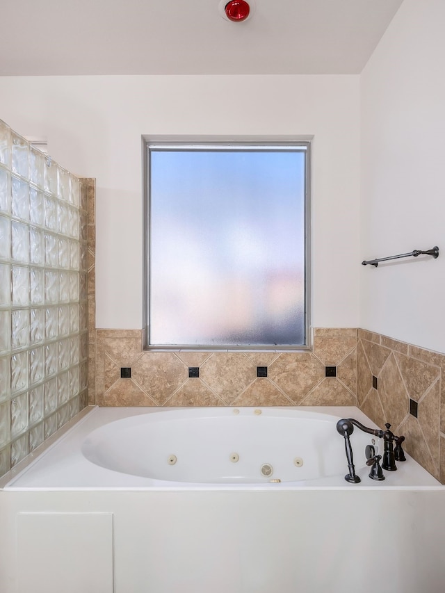 bathroom with a tub