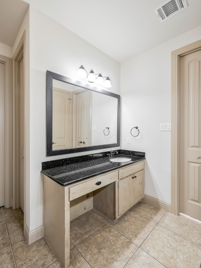 bathroom featuring vanity and tile patterned flooring