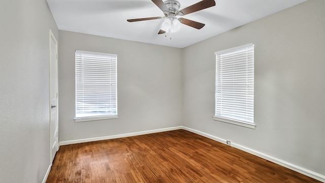 unfurnished room featuring hardwood / wood-style floors and ceiling fan