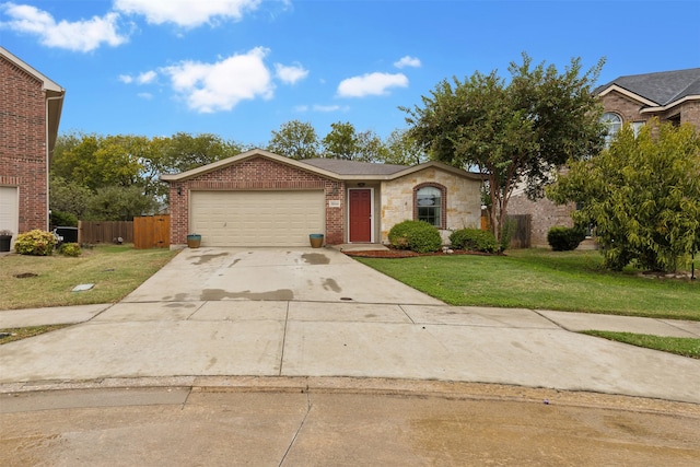 ranch-style house with a garage and a front yard