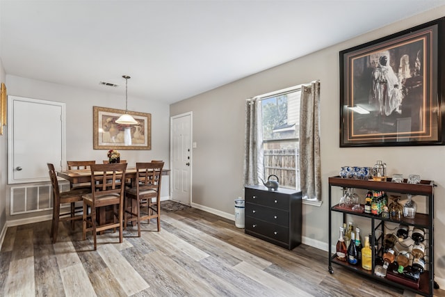 dining room featuring light hardwood / wood-style flooring