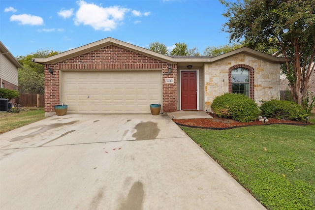 ranch-style home with central air condition unit, a garage, and a front yard