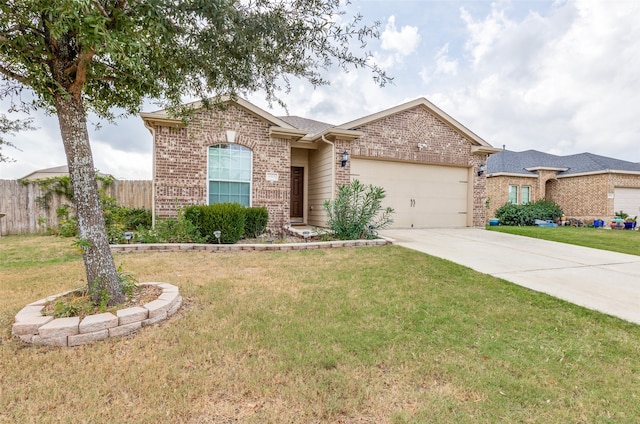 ranch-style house featuring a garage and a front yard