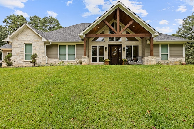 craftsman-style home with a front lawn