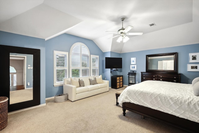 bedroom with lofted ceiling, carpet flooring, and ceiling fan