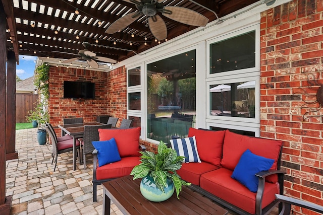 view of patio / terrace with a pergola, outdoor lounge area, and ceiling fan