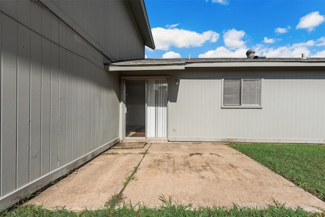 doorway to property featuring a patio